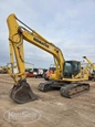 Used Komatsu Excavator in yard